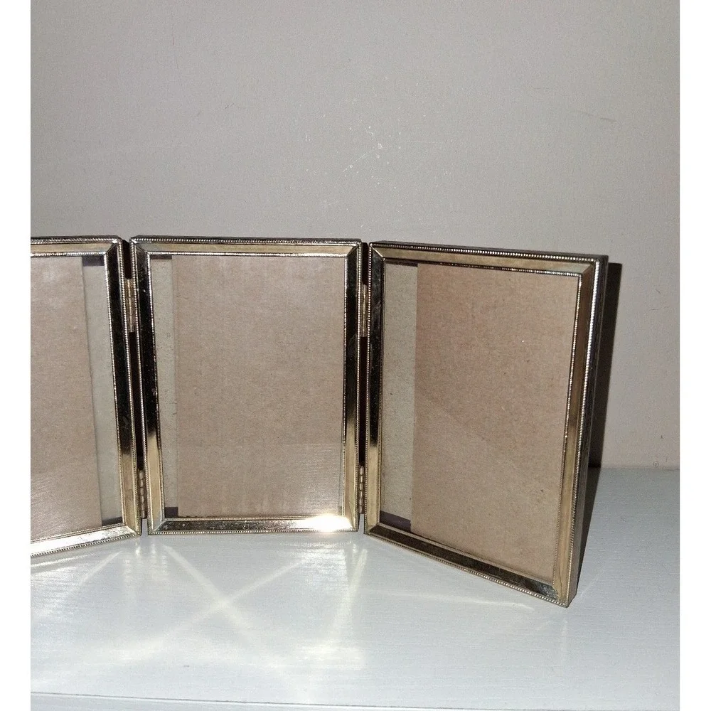 Vintage Gold Tone Tri-Fold Hinged Tabletop Picture Frame Holds Three 3.5 x 4.5